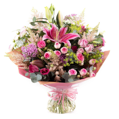 Blush & Beauty - A beautifully handcrafted bouquet in soft, romantic shades of pink, expertly arranged with a mix of premium seasonal blooms and textured foliage. Full of charm and elegance, this eye-catching design combines delicate tones, graceful shapes, and lush greenery to create a truly memorable gift. Presented in stylish wrapping with a water-filled aqua pack for freshness, it's the perfect choice for birthdays, anniversaries, celebrations, or simply brightening someone's day.