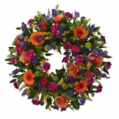 Vibrant Wreath - A vibrant and uplifting funeral wreath designed to celebrate a life well lived. Featuring a rich blend of bold, joyful colours and fresh seasonal textures, this circular tribute symbolises everlasting love, remembrance, and the enduring nature of cherished memories.

Expertly handcrafted by a skilled florist, this striking wreath offers a heartfelt expression of sympathy while reflecting warmth, personality, and gratitude for a loved one's life. Suitable for funeral services, memorials, and celebrations of life, it provides a beautiful focal tribute and a lasting gesture of respect.